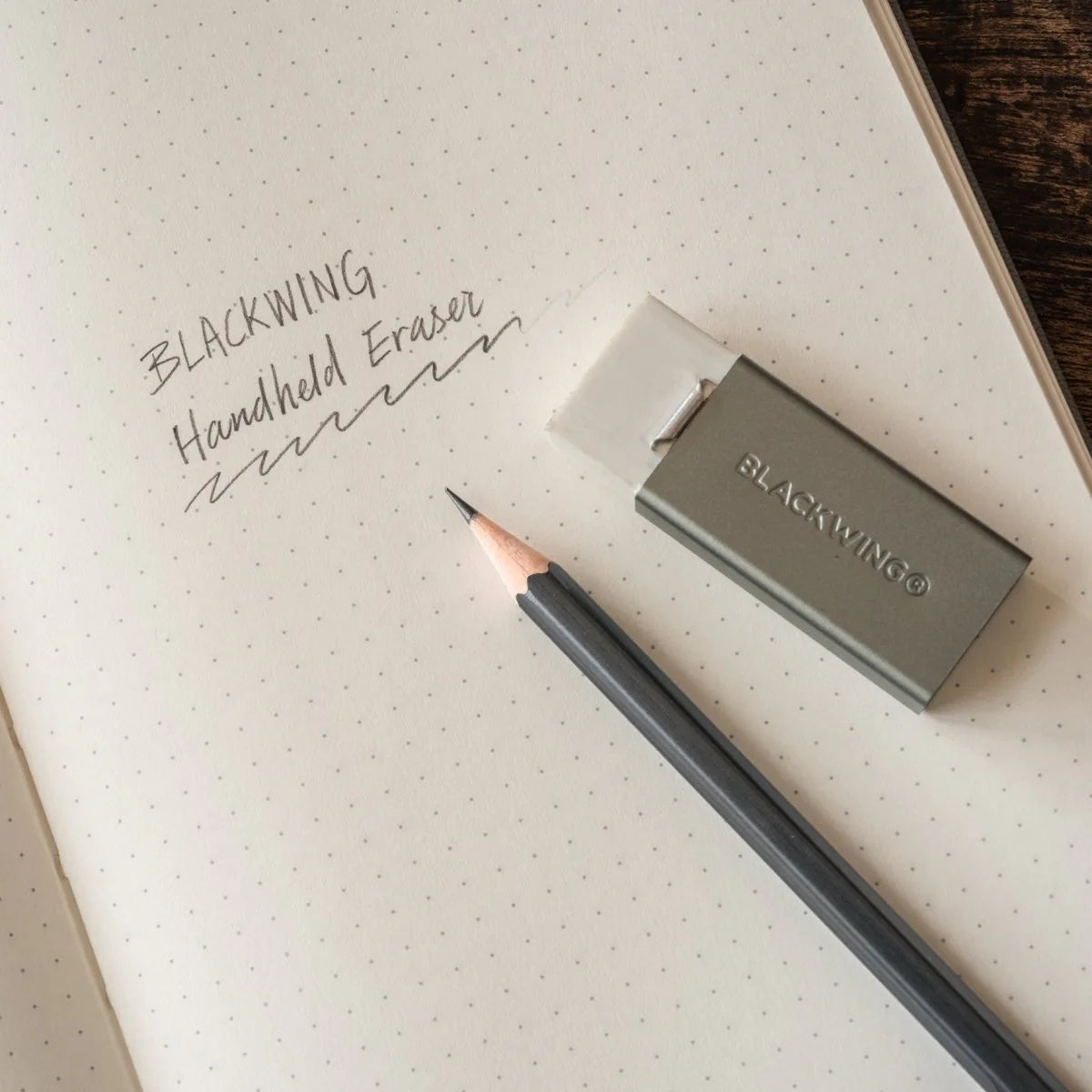 We took the iconic design of our eraser clip and adapted it into a sleek handheld form that feels great to use.

The eraser is made of a special soft material that erases the dark lines of our graphite cleanly and easily. The holder is made of durable aluminum that lets you get a solid grip while erasing. It also includes a jumbo-sized version of the iconic Blackwing clip, so you can extend the eraser as you use it.