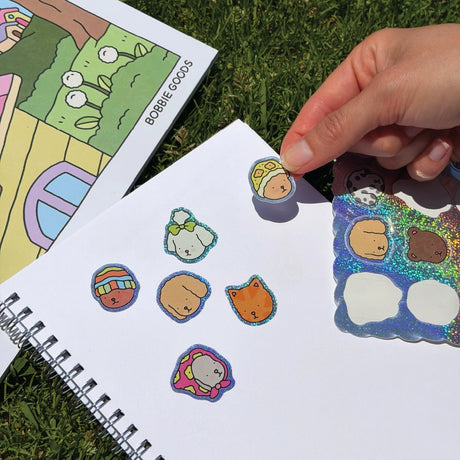 Bobbie Goods Sticker Sheet - Super Sparkly

24 glitter stickers!
Weatherproof
Gloss finish
Sheet is 5" x 7"