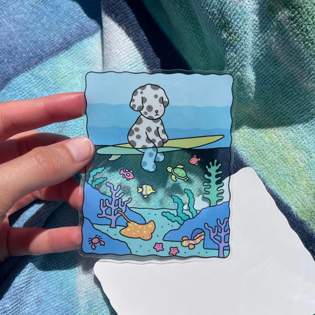 Bobbie Goods Vinyl Sticker - Underwater

Blue water in the middle is see-through!
Weatherproof
Gloss finish
3" x 3.7"