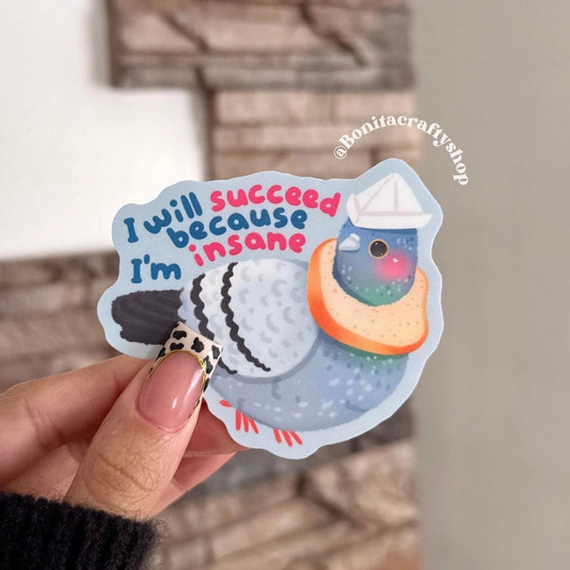 This funny pigeon sticker features an adorable pigeon wearing a little paper hat with the phrase “I will succeed because I’m insane” — perfect for anyone powered by chaos, determination, and a sense of humor. 🐦🩵

♡ STICKER DETAILS ♡
~ Sticker size: 3’’ inches
~ Printed on matte sticker paper
~ Matte Laminate finish ✨
~ ONLY Handwash. This sticker is not dishwasher or microwave safe.