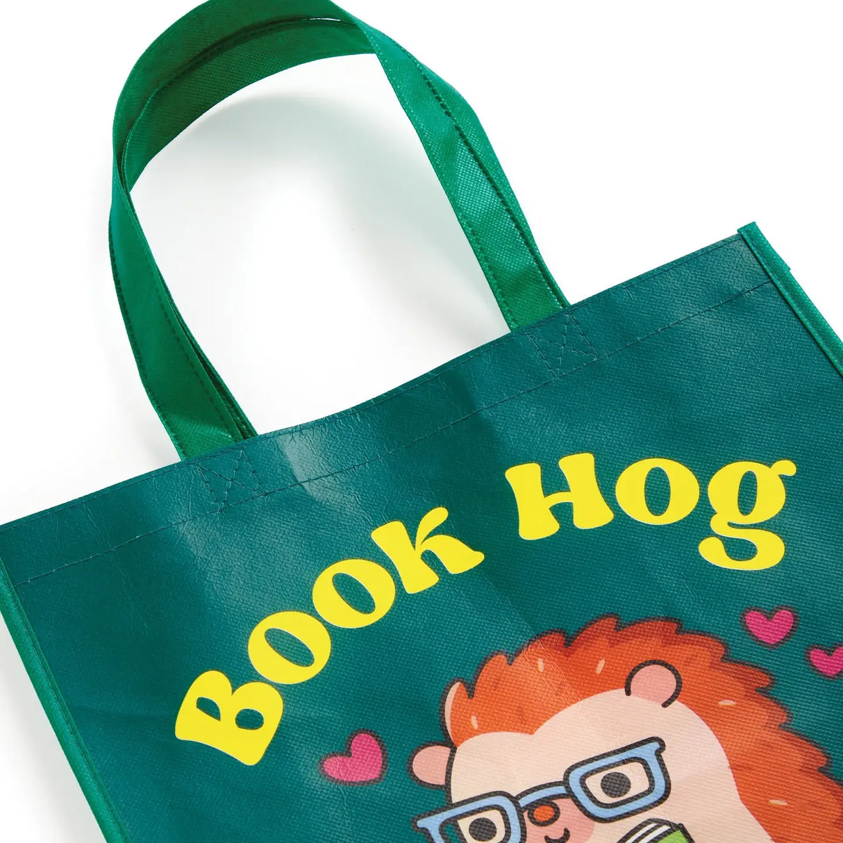 Oink-redibly cute and practical! Our Book Hog Reusable Shopping Bag is the perfect piggy companion for your shopping adventures. This adorable book-loving hog design turns errands into fun while helping you ditch single-use bags. Sturdy enough for groceries, books, or beach essentials, it folds up small when not in use. Shop sustainably with this playful porker that's always ready to carry your treasures!