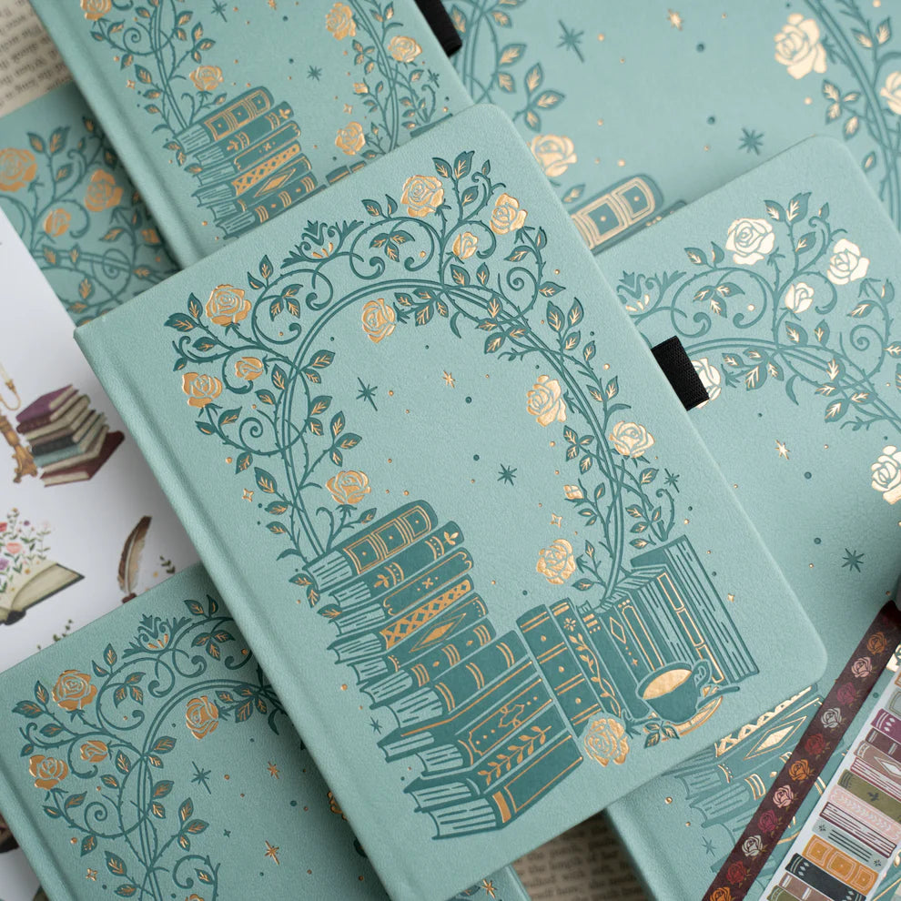 A love letter to book lovers, the Books of Beauty Reading Notebook is designed for cozy reading moments and thoughtful reflection.

Featuring a soft vegan leather cover in a dreamy seafoam hue, delicate gold-foil accents, and an elegant interior end page pattern, this notebook is as beautiful as it is functional—perfect for reading logs, book reviews, TBR lists, and journaling your favorite quotes.

A timeless addition to any stationery or bookish collection—ideal for readers, writers, and journal lovers.