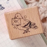 A small wood stamp of a little pigeon delivering your mail for your planner and scrapbooking needs. Each stamp measures approximately 1 x 0.75 inch.

Stamps come loose and without any extra packaging.
