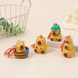 This adorable keychain adds personality wherever you go, whether clipped to your keys, bag, or backpack. Cute, lightweight, and easy to gift, it’s perfect for anyone who loves whimsical accessories or capybara-themed goodies.&nbsp;

Approx 2in x 2in
Includes 1 keychain&nbsp;
