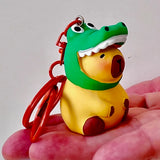 This adorable keychain adds personality wherever you go, whether clipped to your keys, bag, or backpack. Cute, lightweight, and easy to gift, it’s perfect for anyone who loves whimsical accessories or capybara-themed goodies.&nbsp;

Approx 2in x 2in
Includes 1 keychain&nbsp;