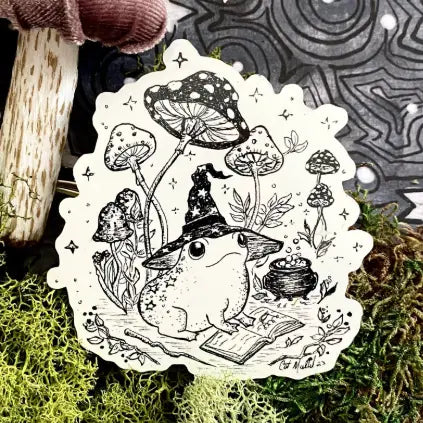 Toado the Magnificent, a magical toad learning spells in a whimsical forest!

Includes one 3" vinyl sticker

Dishwasher Safe and Water resistant
Perfect for water bottles, laptops, folders and more!