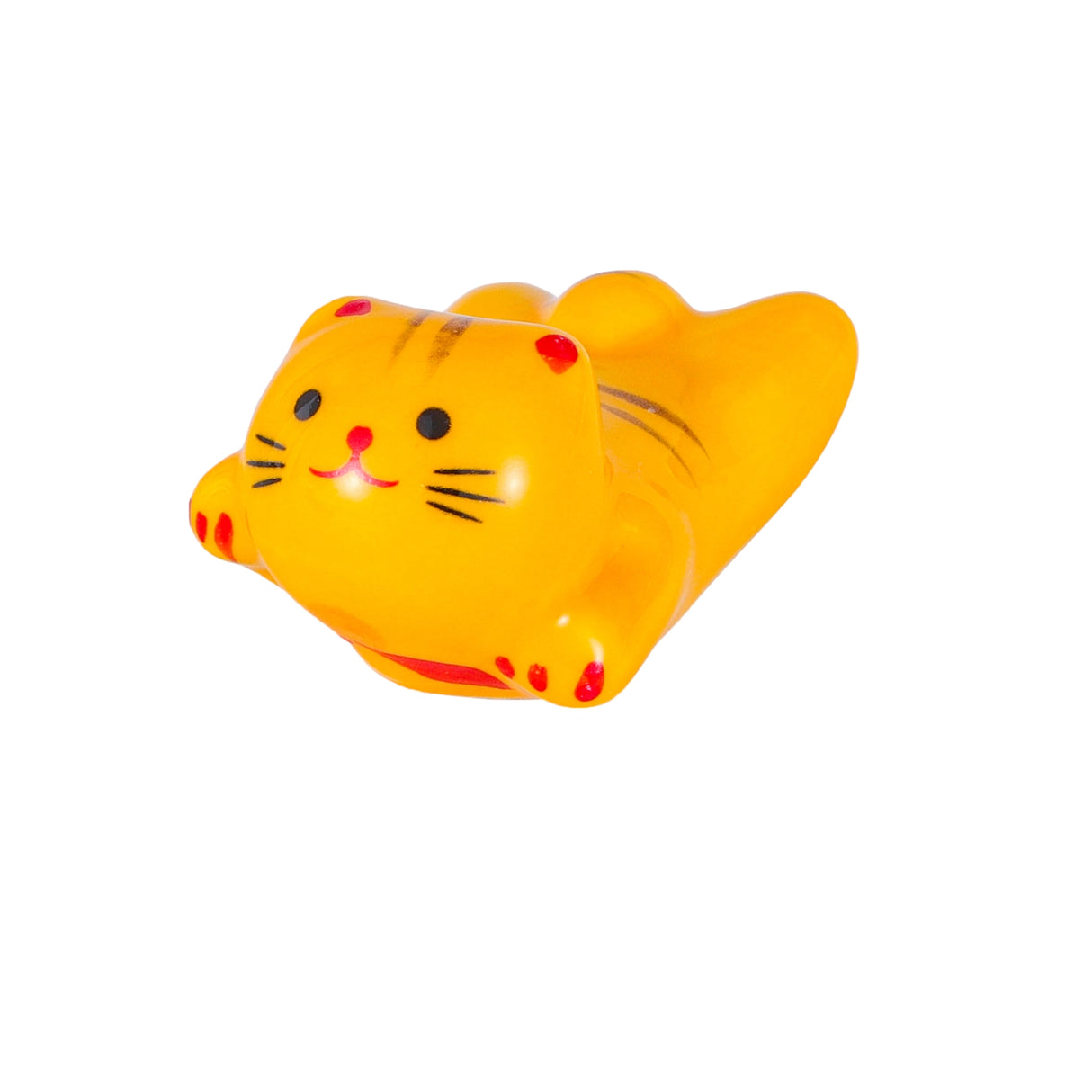 Porcelain yellow cat chopstick rest / pen rest.