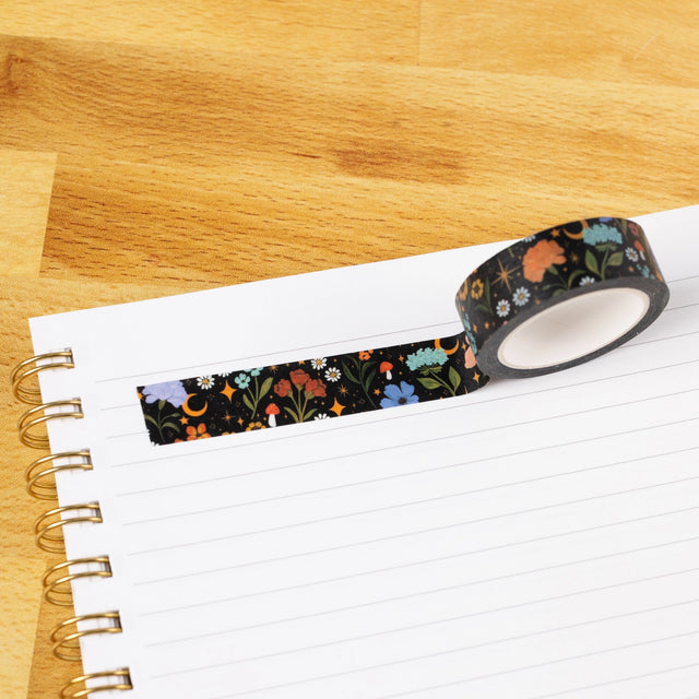 Celestial Garden Washi Tape

Our washi tape is made for paper lovers, pen pals, and anyone who gets butterflies in the stationery aisle. Perfect for journaling, scrapbooking, decorating envelopes, or adding a personal touch to planners and calendars. It's gentle on paper, easy to tear by hand, and removable without leaving residue, so you can rearrange, redo, and re-stick as needed.

Design Features:&nbsp;

Each roll measures 15mm wide on a 10m roll
Full color repeating pattern
Washi tape dispenser packagin