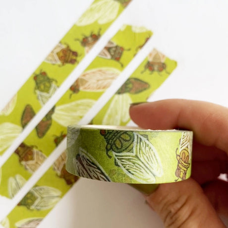  Our cicada washi tape is a vibrant green tape created in homage to the loudest bug on the block: the cicada! This is a lightweight decorative tape printed on traditional rice paper. It is removable and leaves no residue, making it perfect for scrapbooking, stationery, crafts and more. Featuring a collection of complementary nature inspired designs that bring a pop of color to all your projects! Perfect for gifting and arts + crafts displays.

Tape dimensions: 15mm x 10m, or 0.59” x 32.8’ 