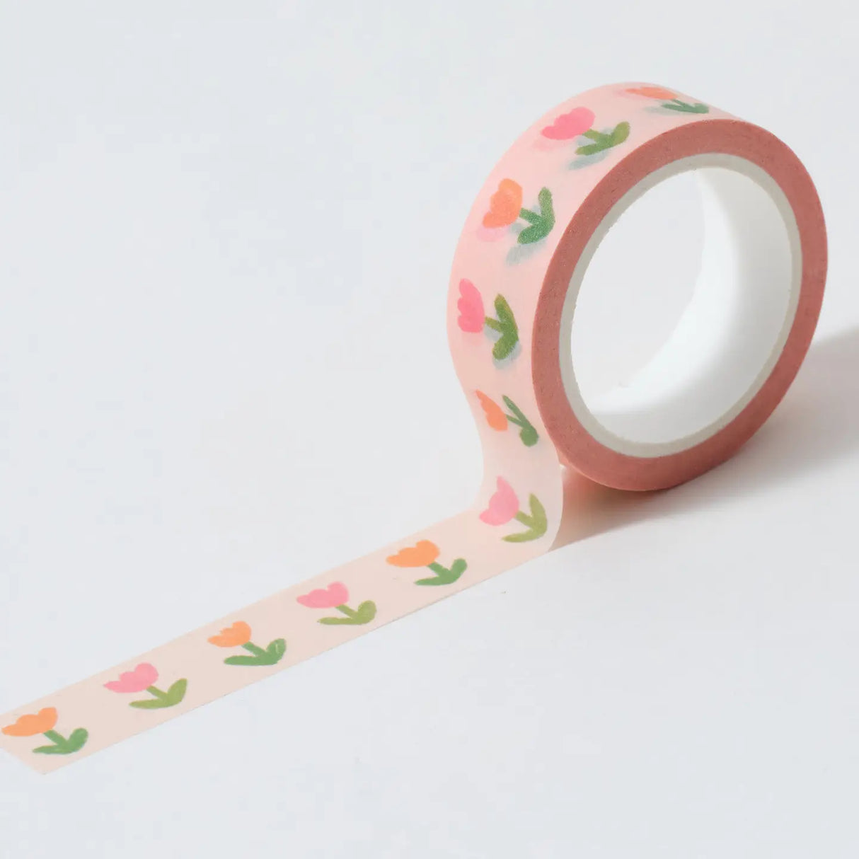 Cute floral wash tape in a pastel peach colour tone with pink and orange tulips.

This paper tape is perfect for decorating your bullet journal and planners, scrapbooking & gift wrapping. It'll add some fun and colour to any surface and is easy to peel off.