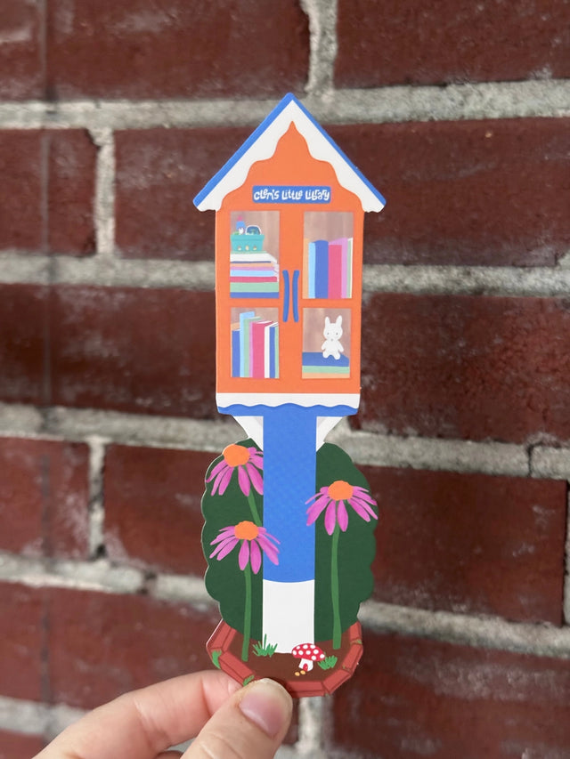 Little Library Bookmark by Clem &Co.

If you have ever passed a Little Free Library, you know how great of a resource they are for making knowledge accessible. Clem the Bunny put together her own Little Free Library and loved it so much she turned it into a bookmark!