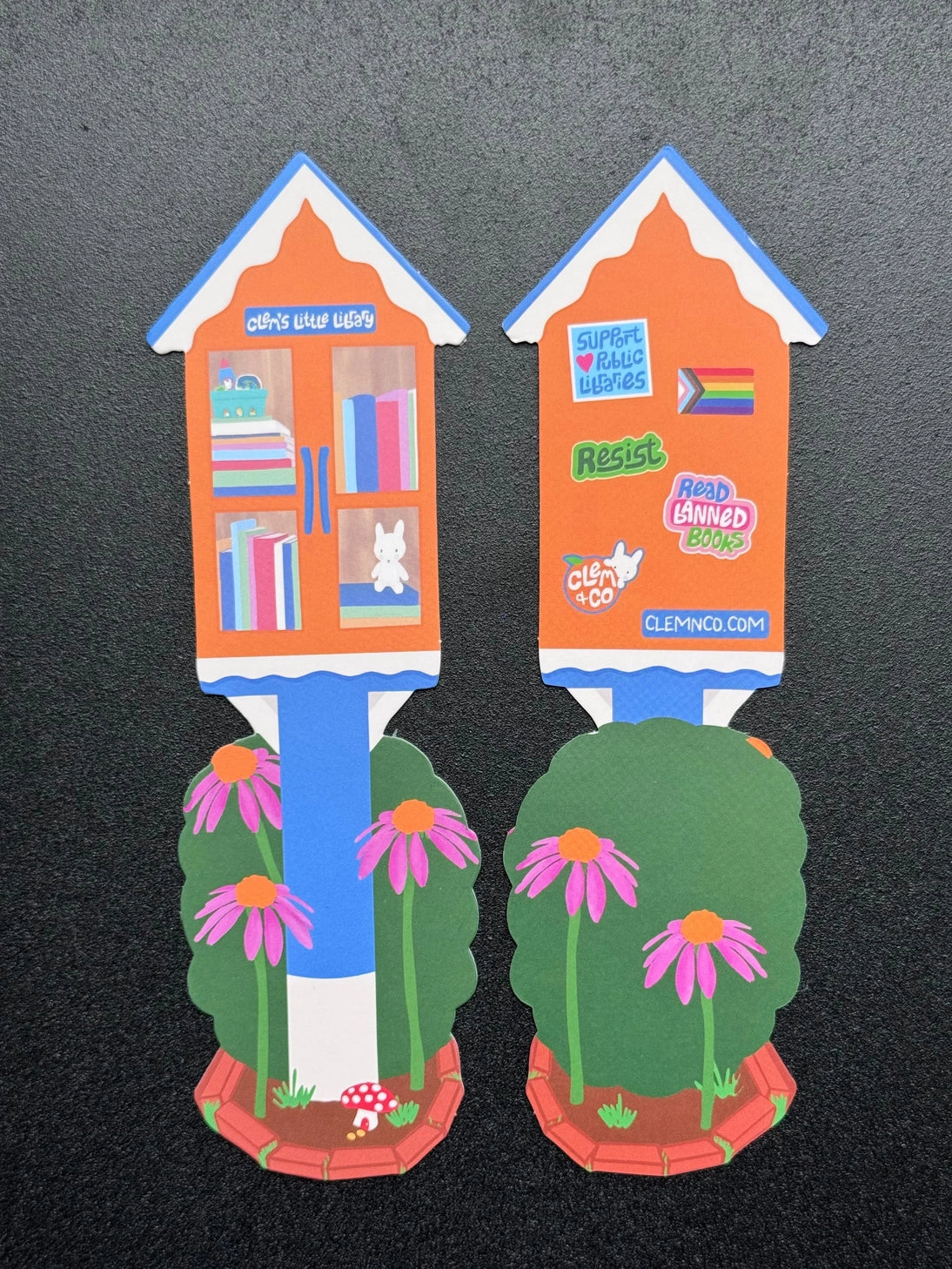 Little Library Bookmark by Clem &Co.

If you have ever passed a Little Free Library, you know how great of a resource they are for making knowledge accessible. Clem the Bunny put together her own Little Free Library and loved it so much she turned it into a bookmark!