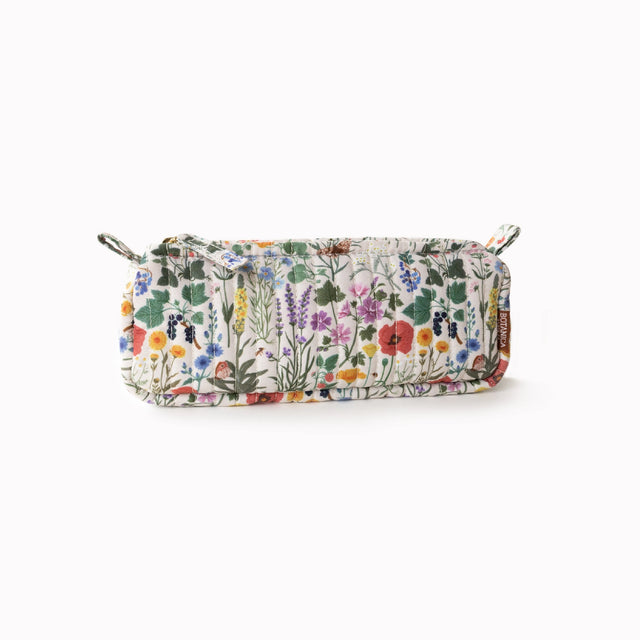 Each versatile pouch showcases premium quilted cotton in four distinct illustrated patterns, complemented by an elegant gold brass zipper with coordinating pull—adding a sophisticated finishing touch to these signature pieces.

Features:

Size: 7" x 3" x 2"
Premium quilted cotton exterior
Coordinating interior cotton lining
Gold brass zipper with matching pull
Versatile use as pencil pouch or makeup bag
Perfect for desk display or on-the-go organization