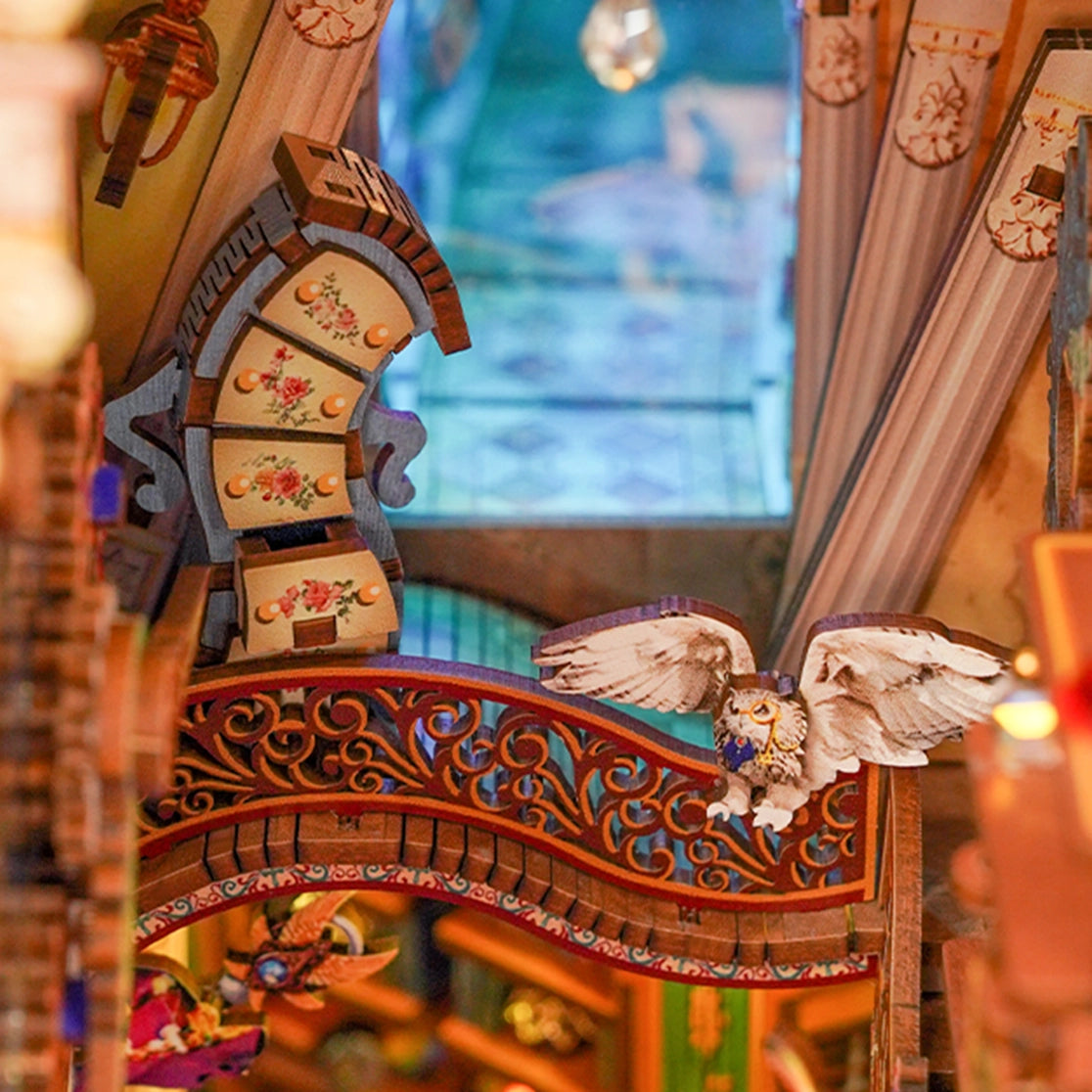 Venture into a realm where knowledge is power and magic lingers in the air with this captivating DIY book nook kit that brings a spellbinding scene to life-complete with soaring shelves, glowing lanterns, and a majestic white owl mid-flight, guiding the way through ancient tomes and arcane secrets.