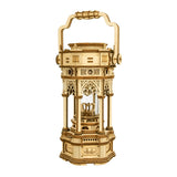 This ornate lantern DIY music box lights up as well as plays to the melody of "YOU LIGHT UP MY LIFE" after being wound up.

• Music box tune: YOU LIGHT UP MY LIFE

• Assembled size: 140 x 115 x 300mm.

• Pieces: 210 pcs.

• Age range: > 14 years old