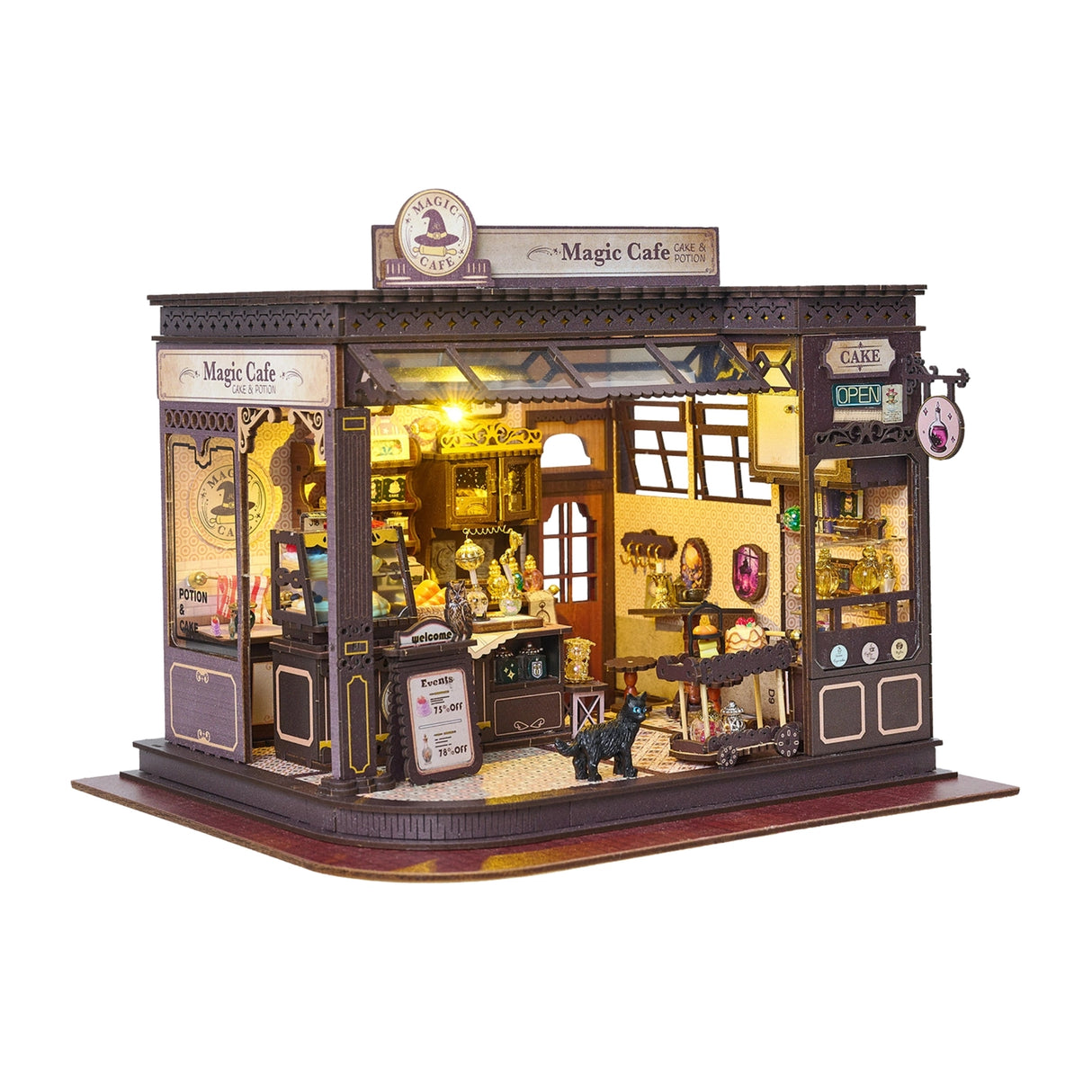 Step into a whimsical world of sugar, spells, and stardust with the Magic Café DIY Miniature House Kit. This enchanting build-it-yourself café brings to life a cozy little corner where witches, wizards, and woodland creatures gather for enchanted brews and magically infused pastries. Watch as tiny shelves fill with jars of mysterious ingredients, and the glass display case glows with cakes that sparkle with edible enchantments.

2 AAA batteries required; batteries are not included.
Ages 14+ 380 pieces
Assem