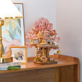 Craft a fairy sakura-scented retreat with this Rolife 3d puzzle! Delicate cherry blossoms, a swing, spiral stairs &amp; lift basket channel —no plastic, just soul-soothing wood. The miniature kit brings adventure fantasies to life.

535-piece 3d puzzle click snugly without glue—just gentle pressure! (no nail-breaking snaps!). Enjoy 5 hours of immersive, stress-relieving fun with the miniature kit. Perfect for unwinding after work or sharing quality time with family.