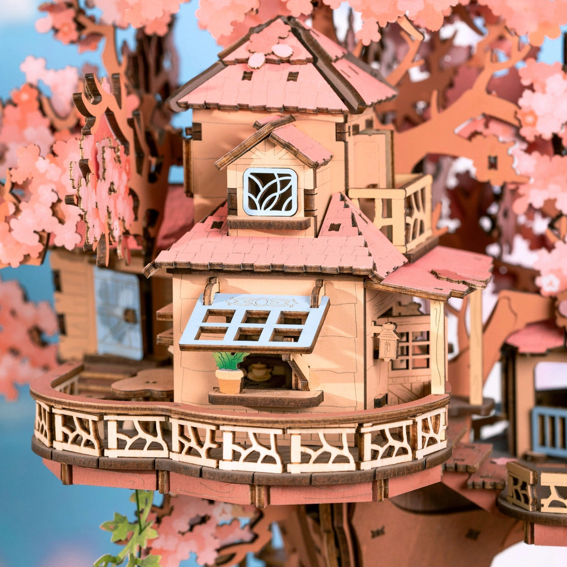 Craft a fairy sakura-scented retreat with this Rolife 3d puzzle! Delicate cherry blossoms, a swing, spiral stairs &amp; lift basket channel —no plastic, just soul-soothing wood. The miniature kit brings adventure fantasies to life.

535-piece 3d puzzle click snugly without glue—just gentle pressure! (no nail-breaking snaps!). Enjoy 5 hours of immersive, stress-relieving fun with the miniature kit. Perfect for unwinding after work or sharing quality time with family.