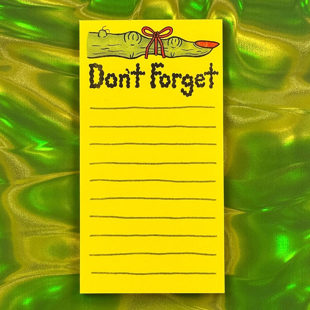 This witchy finger is pointing at YOU because you will forget… unless you write it down. Featuring a spooky green finger with a bright red string tied around it, this notepad is basically a slightly cursed personal assistant. Jotting down spells, snacks, errands, ominous prophecies, or that one thing you swore you’d remember but didn’t (again).

50 tear-off pages
4" x 7.5"
Magnet attached to back
60 lb text paper with brown chipboard backing
Risograph printed in Knoxville, TN
Packaged in a clear cellophane 