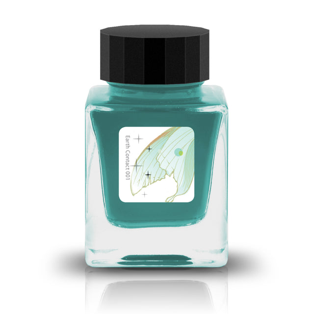 Phosphophyllite, from Tono &amp; Lims’ Earth Contact Series, captures the radiant brilliance of the rare gemstone in ink form. Inspired by birthstones, this shimmering fountain pen ink contains fine glitter particles. Perfect for those who love bold and luminous colors, Phosphophyllite transforms each stroke into a sparkling display of depth and light. Be sure to shake the bottle well before use to evenly disperse the glitter.