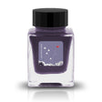Embrace the bold and vibrant tones of nature through Tono &amp; Lims'&nbsp;Earth Contact Line. Inspired by rich gemstones, each ink color is perfect for those who enjoy adding radiance to their collection. Be sure to shake the bottle well before use to evenly disperse the glitter.

RGB: 123, 118, 148
Purple
Shimmering
30 ml