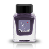 Embrace the bold and vibrant tones of nature through Tono &amp; Lims'&nbsp;Earth Contact Line. Inspired by rich gemstones, each ink color is perfect for those who enjoy adding radiance to their collection. Be sure to shake the bottle well before use to evenly disperse the glitter.

RGB: 123, 118, 148
Purple
Shimmering
30 ml