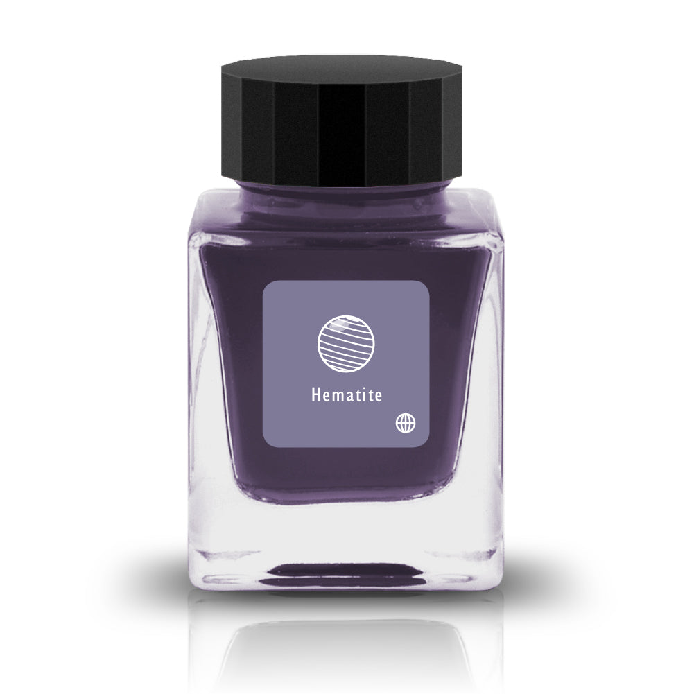 Embrace the bold and vibrant tones of nature through Tono &amp; Lims'&nbsp;Earth Contact Line. Inspired by rich gemstones, each ink color is perfect for those who enjoy adding radiance to their collection. Be sure to shake the bottle well before use to evenly disperse the glitter.

RGB: 123, 118, 148
Purple
Shimmering
30 ml