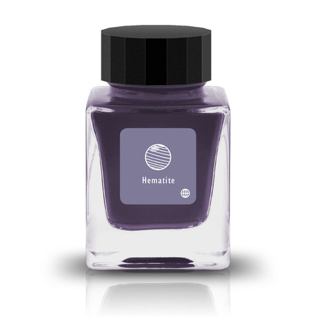 Embrace the bold and vibrant tones of nature through Tono &amp; Lims'&nbsp;Earth Contact Line. Inspired by rich gemstones, each ink color is perfect for those who enjoy adding radiance to their collection. Be sure to shake the bottle well before use to evenly disperse the glitter.

RGB: 123, 118, 148
Purple
Shimmering
30 ml