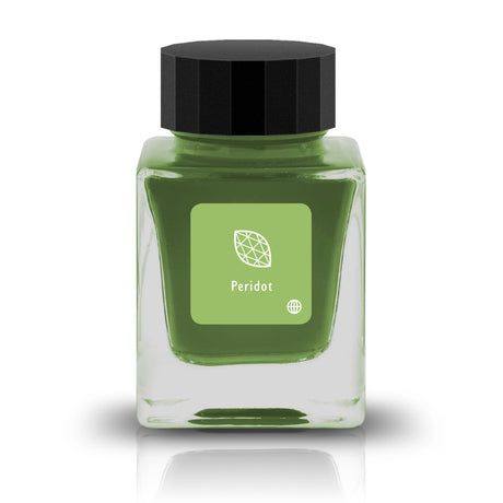 Embrace the bold and vibrant tones of nature through Tono &amp; Lims'&nbsp;Earth Contact Line. Inspired by rich gemstones, each ink color is perfect for those who enjoy adding radiance to their collection. Be sure to shake the bottle well before use to evenly disperse the glitter.

RGB: 157, 191, 105
Green
Shimmering
30 ml