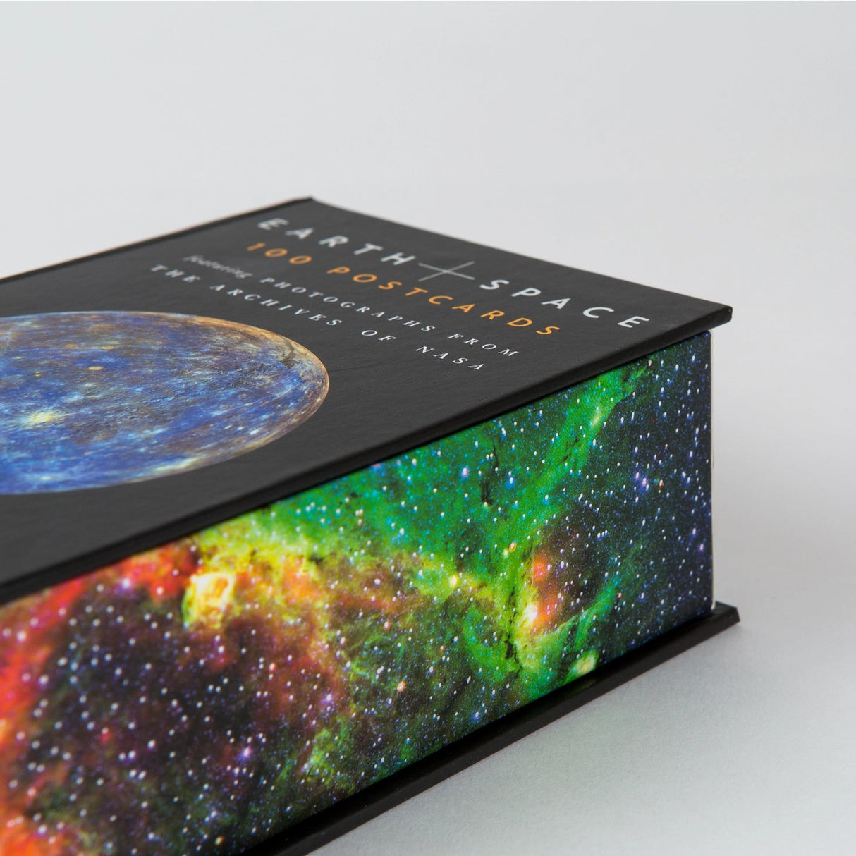 Earth and Space 100 Postcards is a stunning collection of photographs that lets fans of NASA, science, and space exploration share the wonders of the cosmos with friends and family. Each NASA postcard features an astonishing image of Earth from above, the phenomena of our solar system, and the celestial bodies of deep space to create a truly incredible collection that any space fan will cherish. This collection of 100 different NASA postcards will elevate your correspondence with interstellar splendor.