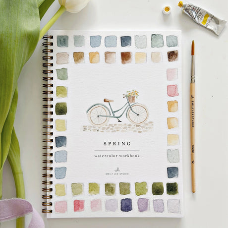 Twelve spring illustrations — a bunny, baby chick, tulips, lilacs, an Easter basket, a bicycle with flowers, and more — each pre-outlined with step-by-step instructions. Paintings take about thirty minutes from start to finish, making it approachable for first-time painters and a favorite for gifting.

Enjoy this peaceful painting hobby on your own, with children, or with friends. Makes a wonderful gift and is perfect for artists of any age.
Details:

12 beginner-friendly illustrations
Thick 120lb watercolo
