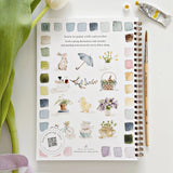 Twelve spring illustrations — a bunny, baby chick, tulips, lilacs, an Easter basket, a bicycle with flowers, and more — each pre-outlined with step-by-step instructions. Paintings take about thirty minutes from start to finish, making it approachable for first-time painters and a favorite for gifting.

Enjoy this peaceful painting hobby on your own, with children, or with friends. Makes a wonderful gift and is perfect for artists of any age.
Details:

12 beginner-friendly illustrations
Thick 120lb watercolo