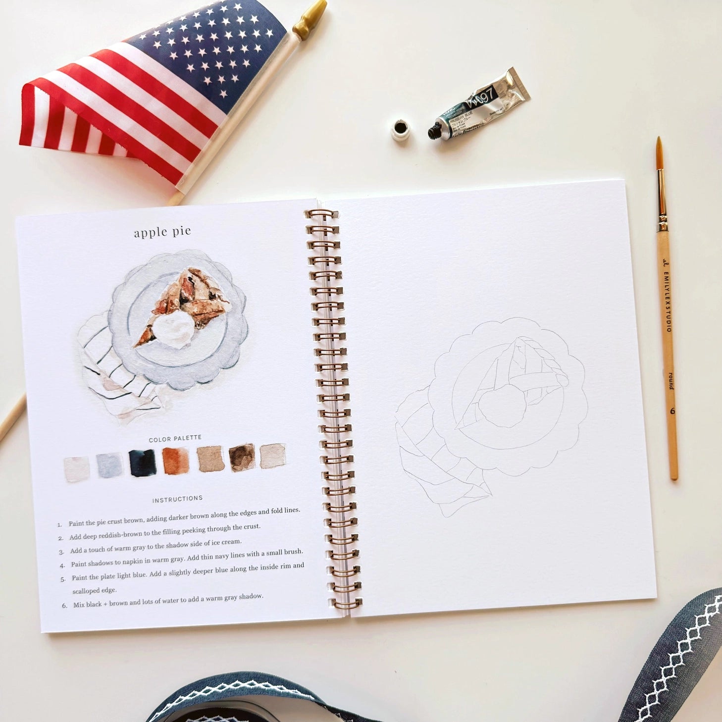 Twelve illustrations of flags, stars, and classic summer scenes — each pre-outlined with step-by-step instructions. Paintings take about thirty minutes from start to finish, making it approachable for first-time painters and a favorite for gifting.

A timely release for America's 250th anniversary in 2026. A strong May–July seller and a natural fit for home, gift, and patriotic-themed boutiques.

12 beginner-friendly illustrations
Thick 120lb watercolor paper&nbsp;
Lay-flat pages with spiral binding for has