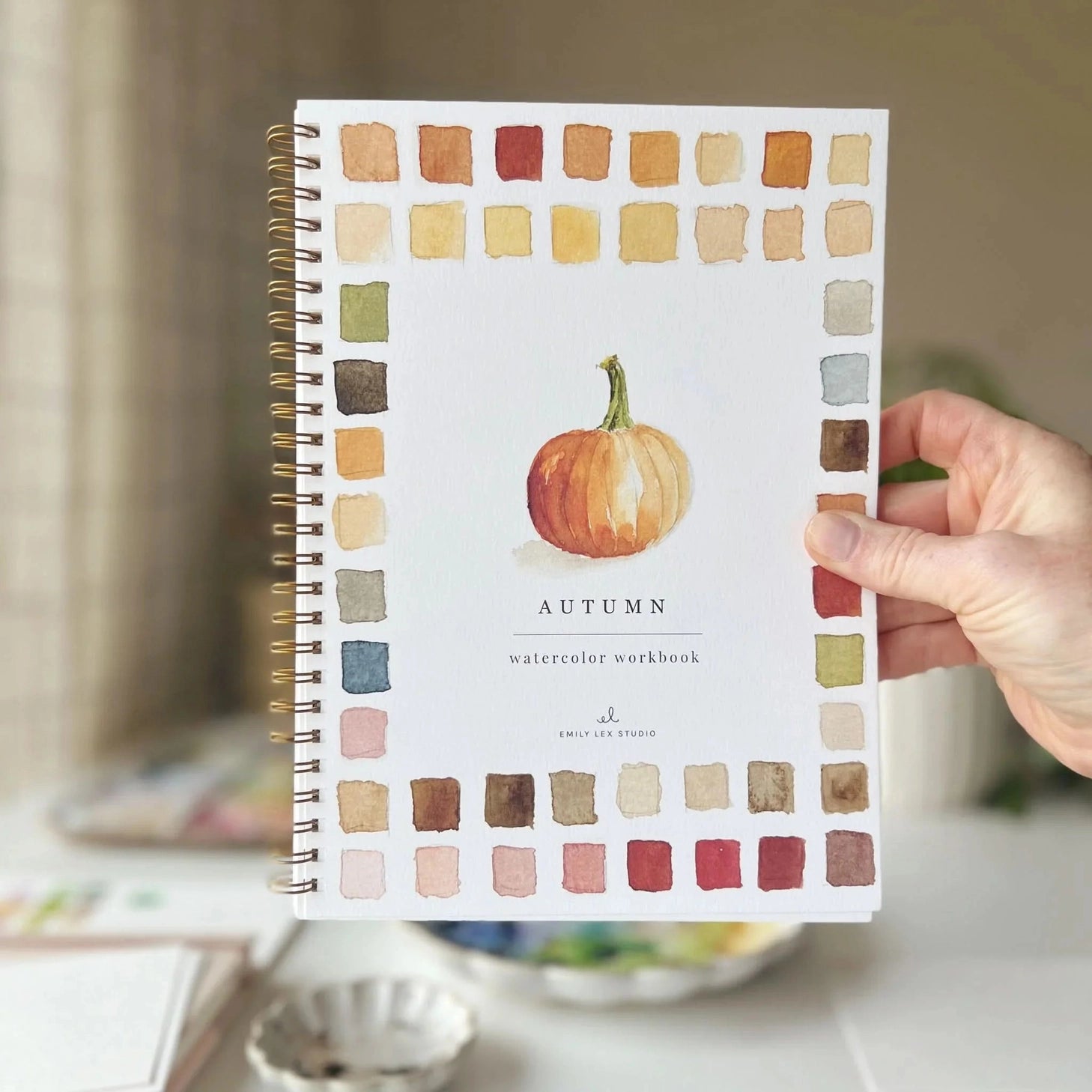 Twelve autumn illustrations — a pumpkin, squirrel, fall leaves, vintage truck, mum bouquet, fall wreath, and more — each pre-outlined with step-by-step instructions. Paintings take about thirty minutes from start to finish, making it approachable for first-time painters and a favorite for gifting.

12 beginner-friendly illustrations
Thick 120lb watercolor paper&nbsp;
Lay-flat pages with spiral binding for hassle-free painting and easy tear-out&nbsp;
Lightly outlined sketches to guide you&nbsp;
Easy to carry