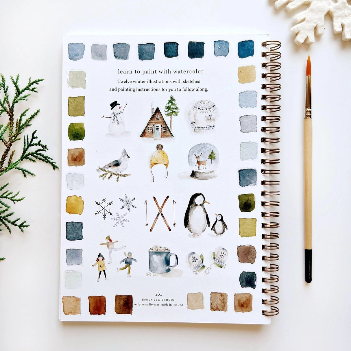Twelve winter illustrations — a snowman, A-frame cabin, fair isle sweater, snow globe, ice skaters, mittens, and more — each pre-outlined with step-by-step instructions. Paintings take about thirty minutes from start to finish, making it approachable for first-time painters and a favorite for gifting.