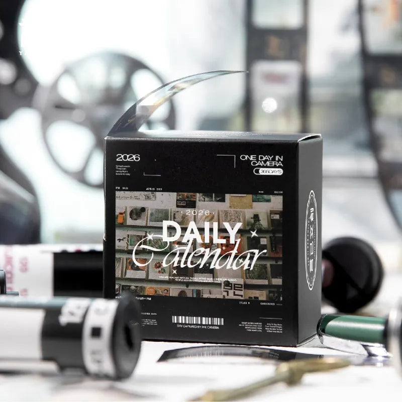 This vintage film themed daily calendar is a great addition for your daily journaling! This roll of PET Tape features a new picture for each day with a date stamp. The box can even be used to hold the tape and keep the next day a surprise!&nbsp;

Precut PET Tape
30mm x 48mm