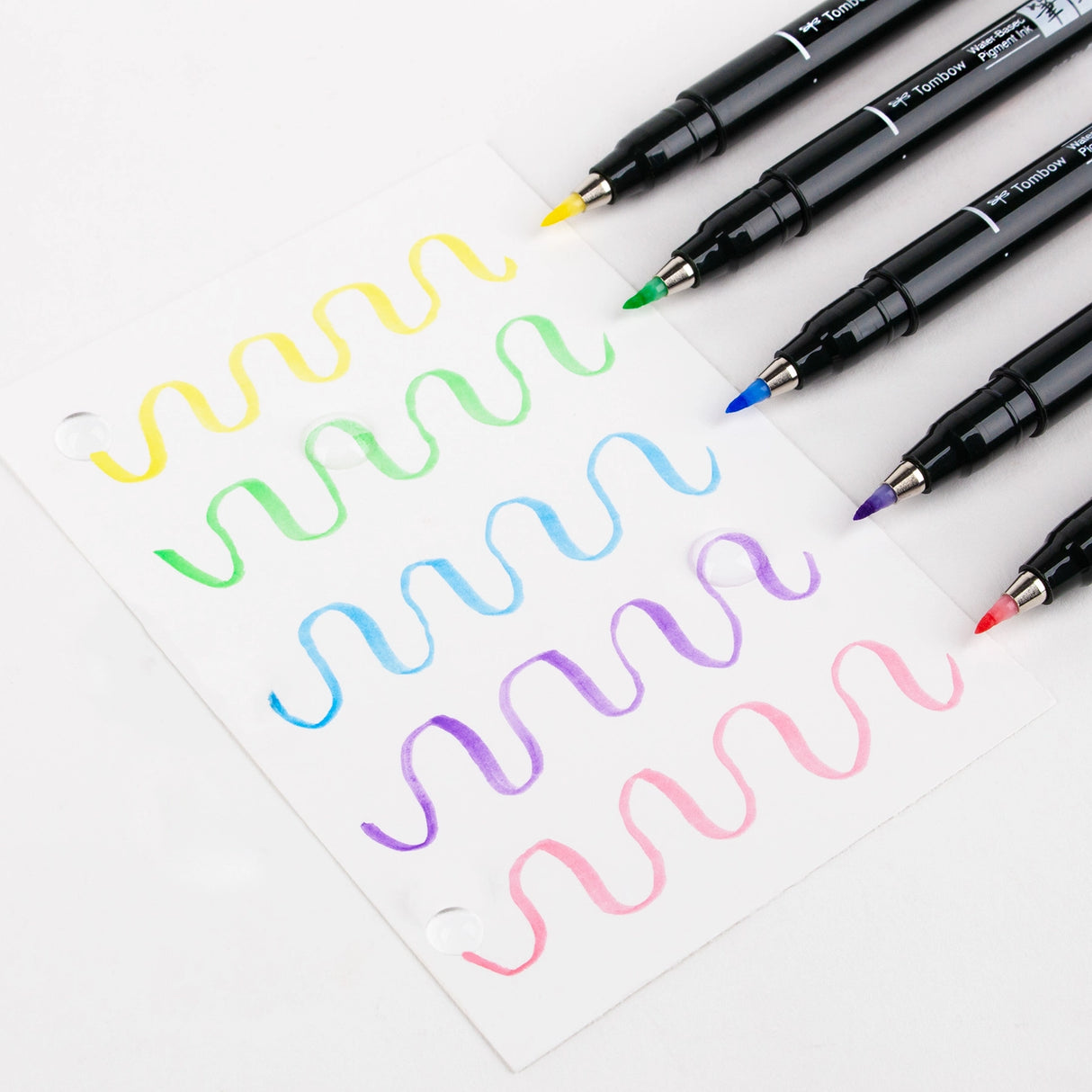 The first Fudenosuke Brush Pen that writes on dark paper!

Soft, flexible brush tip creates thick and thin lines by changing pen pressure. Water-based pigment ink appears as brilliant pastel colors on white paper and chalky pastels on dark paper. When using on dark paper, ink initially appears transparent and color intensifies as it dries.

For optimal opacity on dark paper, apply 2-3 layers to intensify saturation. The water-resistant ink won’t bleed through most papers.

Great for beginner brush calligrap