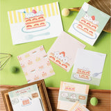 Introducing the cute memo pads from the "Okashina Animal Studio" collection! The Japanese word "okashina" comes with 2 different meanings; one which means funny and one which means sweets. These are both depicted well within the different memo designs that you will see in this collection.