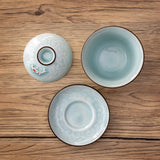 This classic gaiwan teapot is the perfect brewing vessel for many styles of premium teas such as oolong and pu'er&nbsp;

Size: 2" H x 3.25" W x 3.75"D
Capacity: 5oz (150ml)

Material: Porcelain&nbsp;
Origin: China