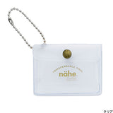 A miniature keychain version of the popular General Purpose Case by nähe. The true-to-original case comes with a clear front pocket with extra inserts inside and out. A ball chain securely attached to the corner of the case lets you hang it onto your keys or bags, perhaps in multiples.

Perfect size to travel with and quickly access your keys, coins, medicine, or small accessories.&nbsp;