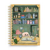 For cat lovers, book lovers, and anyone who believes planning should be delightful, the Cat Library Undated Weekly Planner brings a playful twist to everyday organization. The cover features a vintage-inspired library scene where curious cats lounge, climb, and quietly cause chaos among the shelves. Finished with gold foil details and gold wire binding, this planner feels whimsical yet polished.