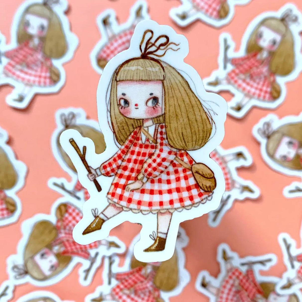 "Twiggy" Vinyl Sticker made from Hannakin illustration.

Made from a durable vinyl with a laminate that protects it from scratching, rain and sunlight.

Sticker measures 45mm x 65mm.