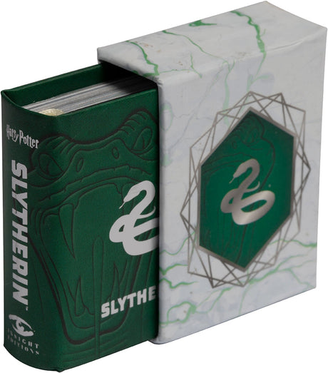 Go behind the scenes of the beloved Harry Potter films and discover all things Slytherin! Meet famous—and infamous—students and staff, explore key locations like the Chamber of Secrets, and learn everything there is to know about the house known for its cunning, ambition, and connection to the Dark Arts. 

One of a new line of collectible pocket-size art books on the Harry Potter films, this book about Slytherin house features exciting artwork and behind-the-scenes facts in a fun, readable miniature size. F