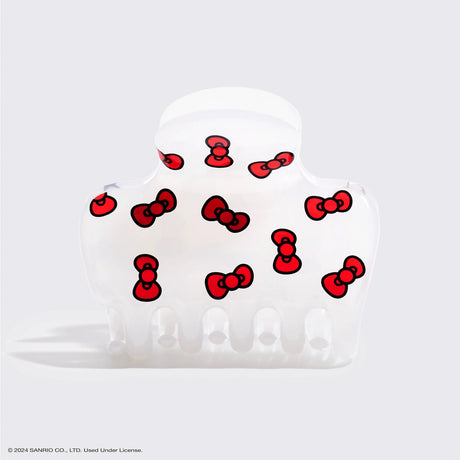 Add a touch of Hello Kitty playfulness to your hairstyle with this claw clip, featuring her signature red bows

Great for half-up styles, buns, and everyday updos. Lightweight, durable, and easy to wear!