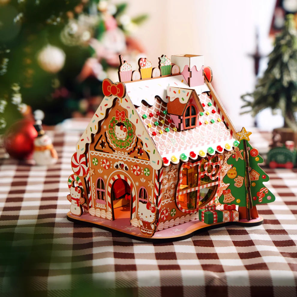 Once upon a time, in a cozy little town, there was a magical gingerbread house that sparkled with sweetness and joy. But this wasn't just any ordinary gingerbread house-it was Hello Kitty's, the beloved girl who filled hearts with love and cheer all over the world.
Bring the festive cheer to life with this Hello Kitty Wooden Gingerbread House Kit! This charming, easy-to-build craft project lets you create your own sweet, wooden gingerbread house adorned with the adorable Hello Kitty design