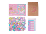 Discover the charm of Hello Kitty with our officially licensed Hello Kitty Wooden Jigsaw Puzzle: Sanrio Edition (88pcs). Crafted from high-quality wood, this puzzle features adorable Hello Kitty illustrations on 88 pieces. Perfect for fans of all ages 8+, it offers an engaging and entertaining puzzle-solving experience. Ideal for solo relaxation or quality time with loved ones, this puzzle will be a delightful addition to any Hello Kitty collection. Embrace the cuteness and nostalgia.