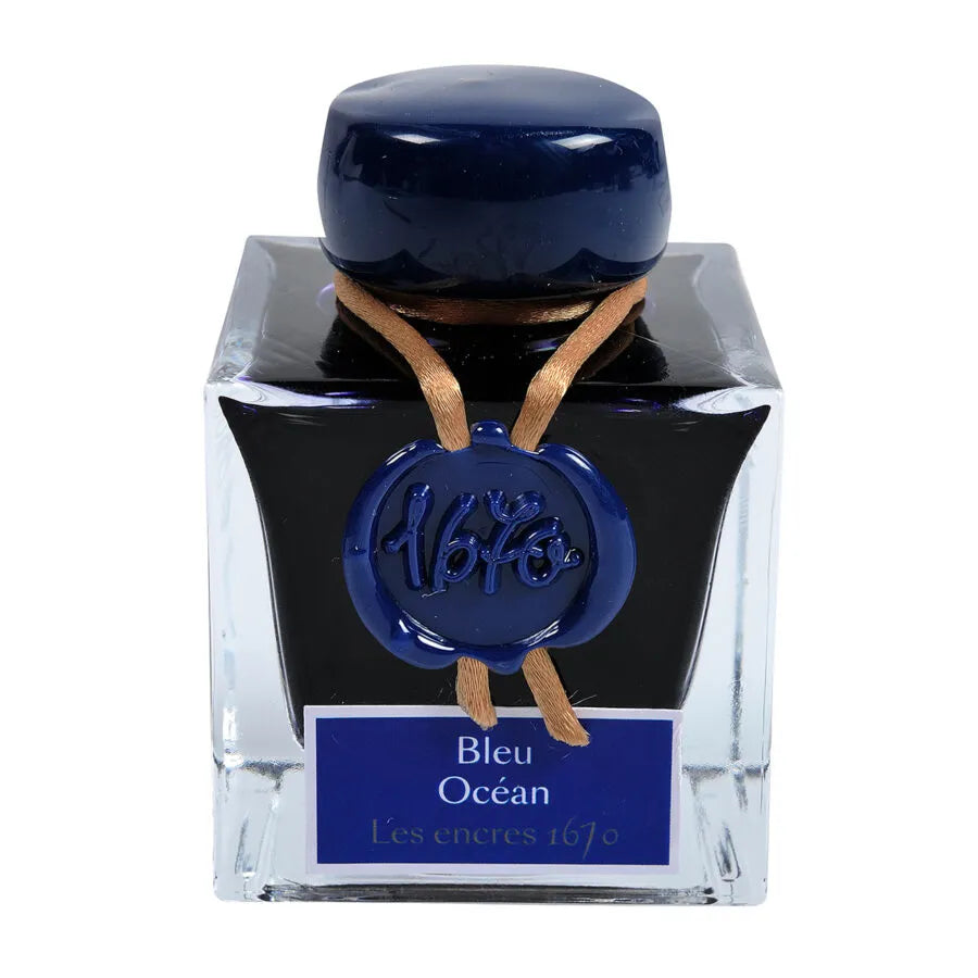 The 1670 Anniversary Collection celebrates the life of the 17th-century French adventurer, Jacques Herbin. Sailing from India, Monsieur Herbin arrived home to Paris with formulas for the now-famous Herbin inks and sealing waxes.

Enhanced with a luxurious, golden metallic sheen, these highly saturated inks will add an elegant luster to all your writing.&nbsp;

The Ocean Blue ink, with its deep, intense colour, is majestic because of its golden sequins that sparkle with a thousand lights. It is a tribute to 
