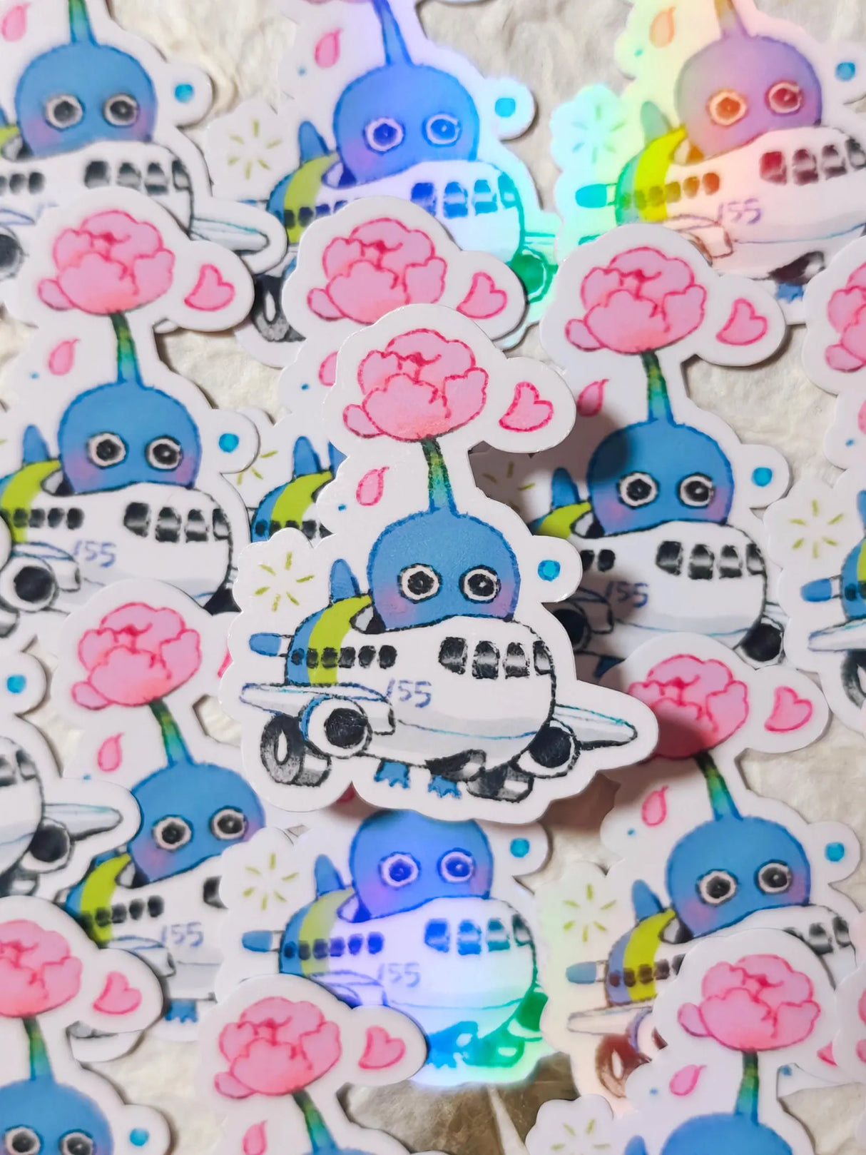This is a glossy vinyl die-cut paper sticker, illustrated and made in-house by me. It's waterproof and ideal for decorating hard surfaces like laptops, water bottles, and phone cases, adding a cute touch to your belongings.

Material: premium glossy waterproof vinyl
