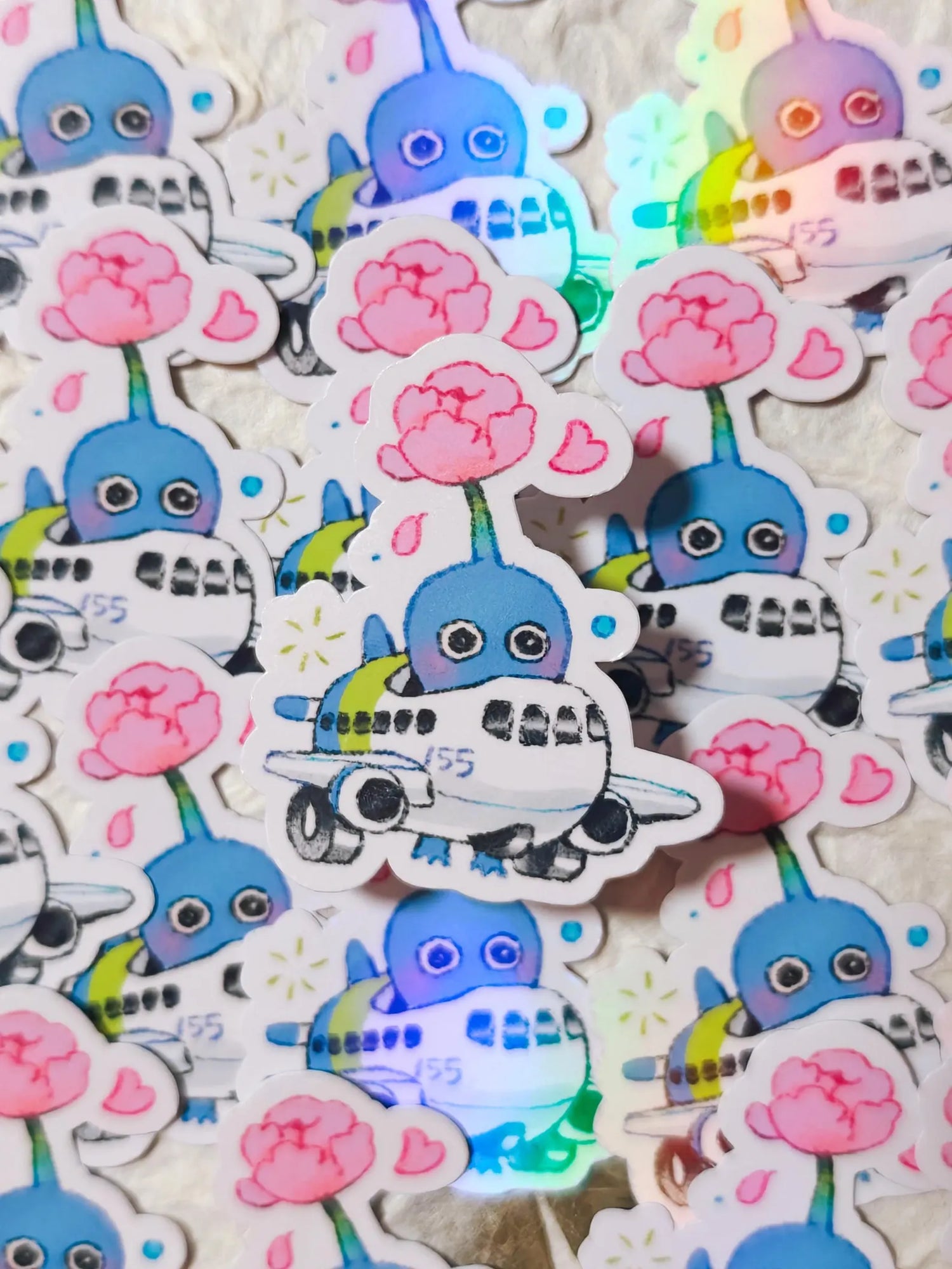 This is a glossy vinyl die-cut paper sticker, illustrated and made in-house by me. It's waterproof and ideal for decorating hard surfaces like laptops, water bottles, and phone cases, adding a cute touch to your belongings.

Material: premium glossy waterproof vinyl