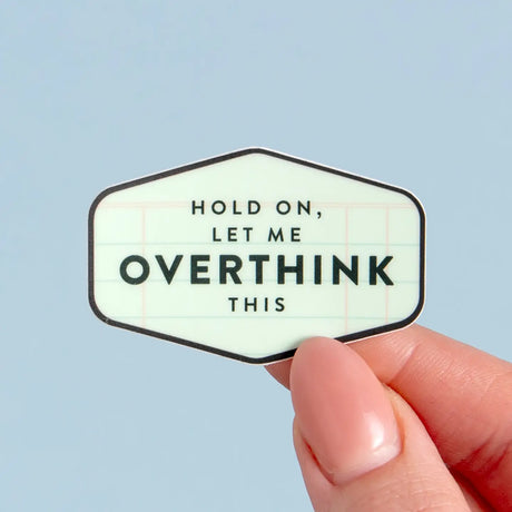 Introducing our Hold On, Let Me Overthink This Decal Sticker—a must-have for every overthinker! This playful sticker captures those moments when you need extra time to ponder life’s dilemmas. Perfect for your laptop or planner, it’s a lighthearted reminder that it’s okay to take your time. It also makes a great gift for friends who share your overthinking tendencies—because who doesn’t appreciate a little humor? Embrace your unique thought process and let the world know: sometimes, you just need to pause an
